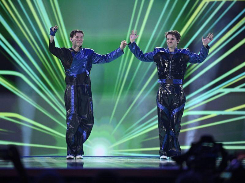 Marcus & Martinus waving to the crowd from the Eurovision 2024 stage